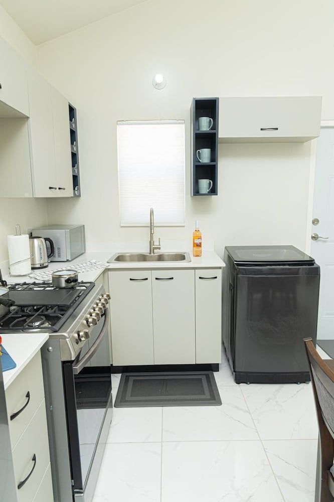 Phoenix Park Villas Portmore Family House, Garden View 13