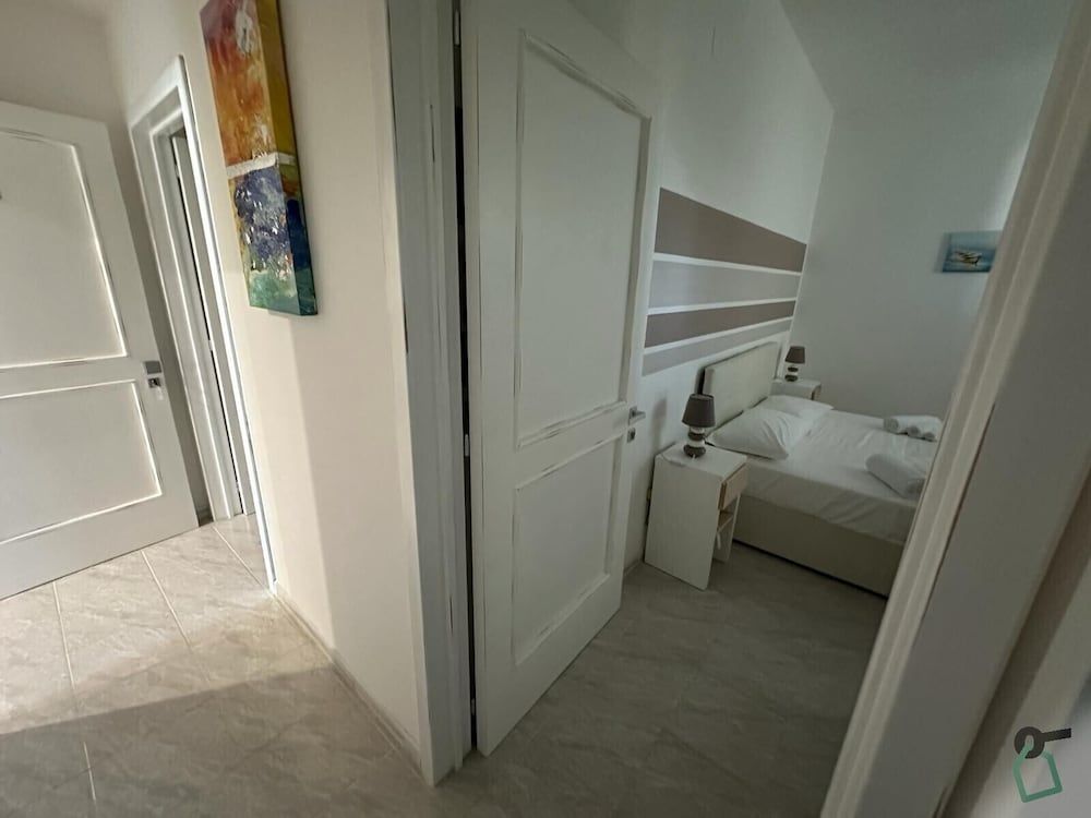 Hotiday Porto Cesareo Quadruple Room 2