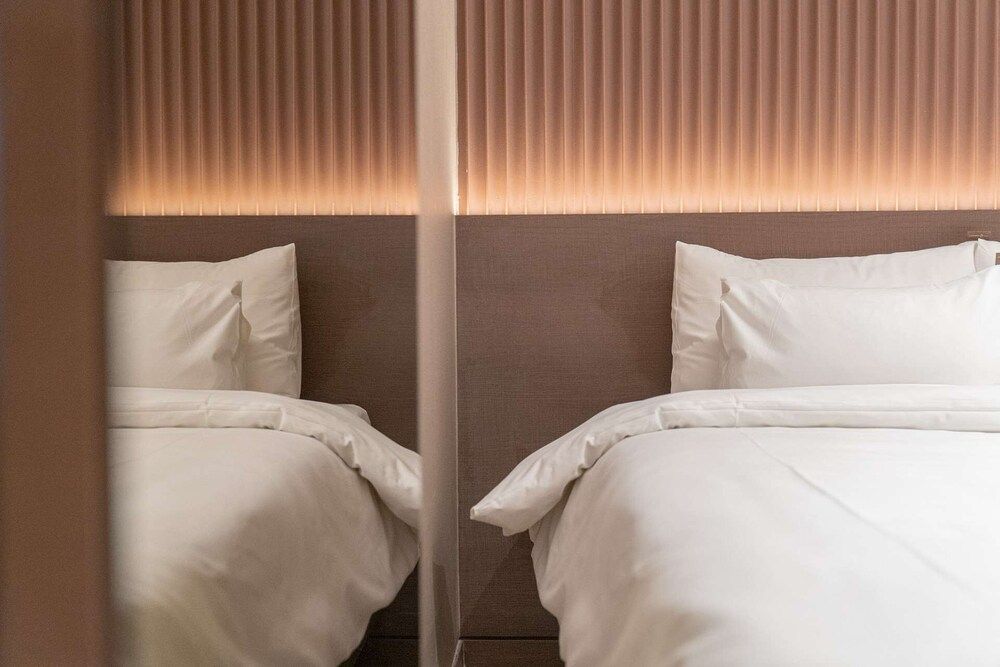 From H About Hotel Chungju Deluxe Twin Room 7
