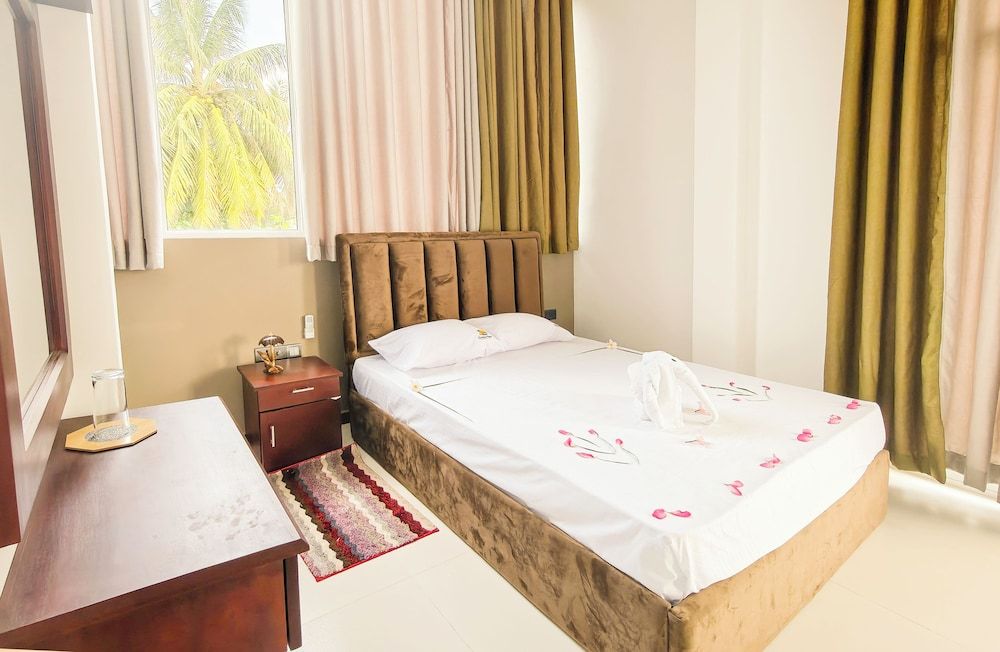 Sasnidu Villa Deluxe Triple Room 5