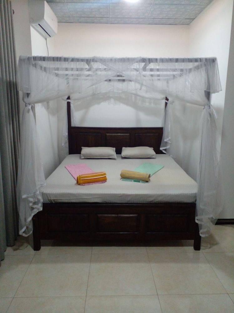 Amible guest home Deluxe Room 8