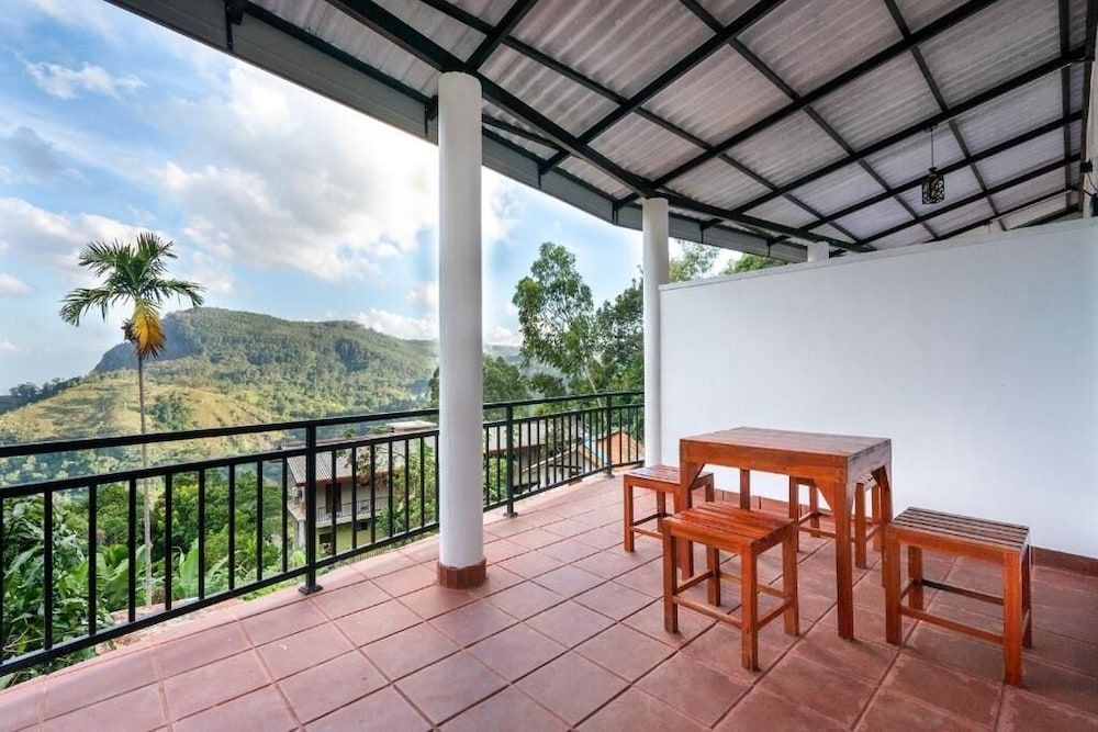 Ella Ostella Family Room, Balcony, Mountain View 5