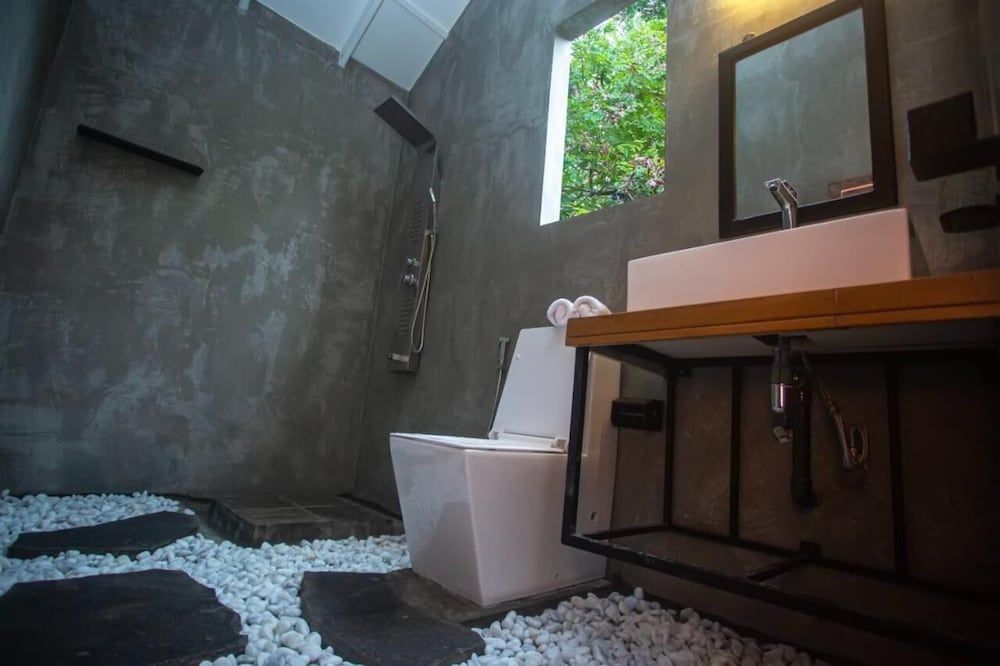 Aaradhya Madu Ganga Deluxe Triple Room, Balcony, Garden View 4