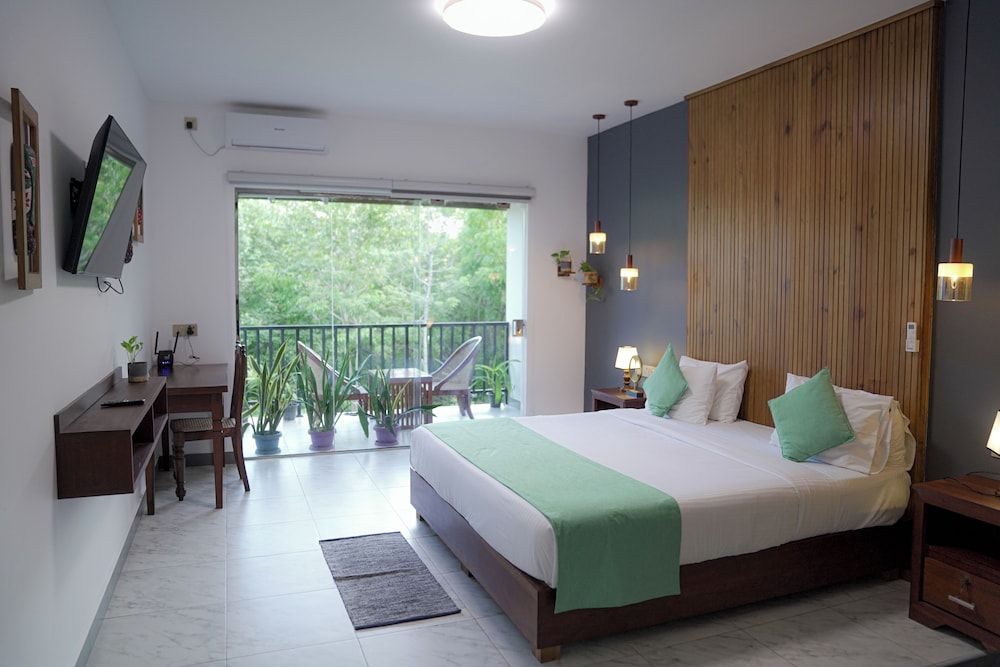 Aaradhya Madu Ganga Deluxe Double Room, Balcony, Garden View 6