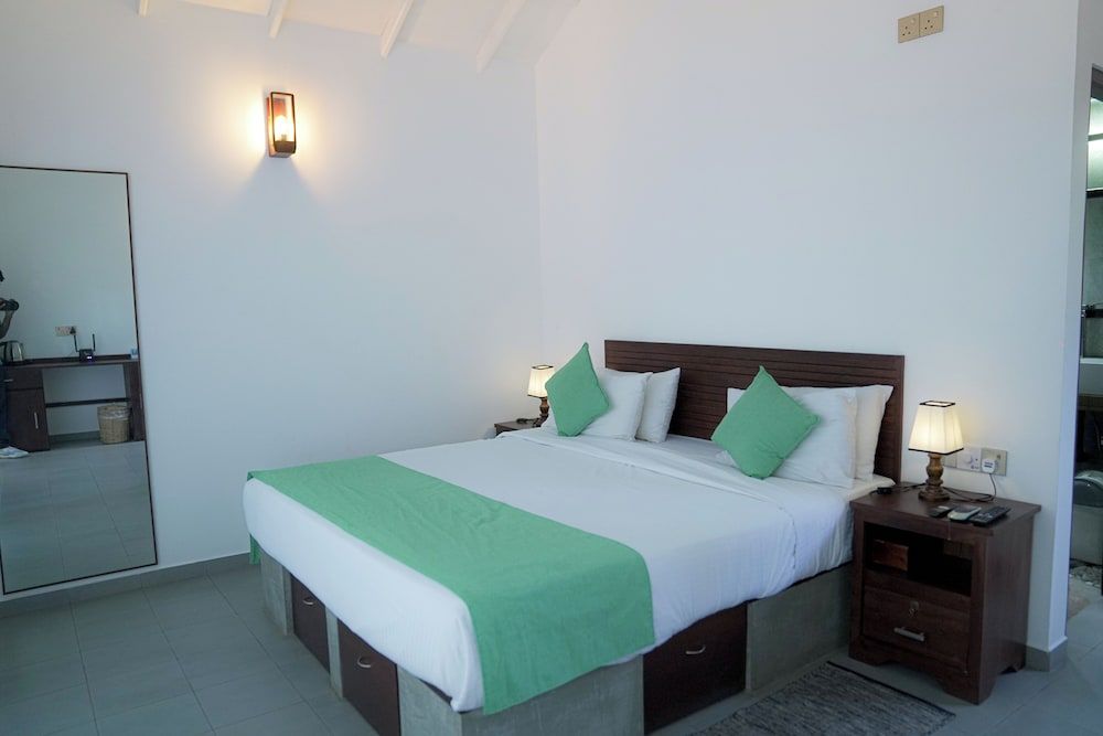 Aaradhya Madu Ganga Deluxe Double Room, Balcony, Garden View 4