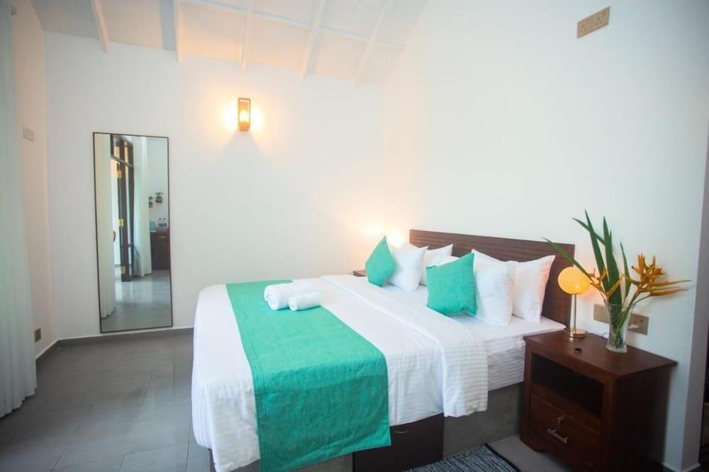 Aaradhya Madu Ganga Deluxe Triple Room, Balcony, Garden View 5