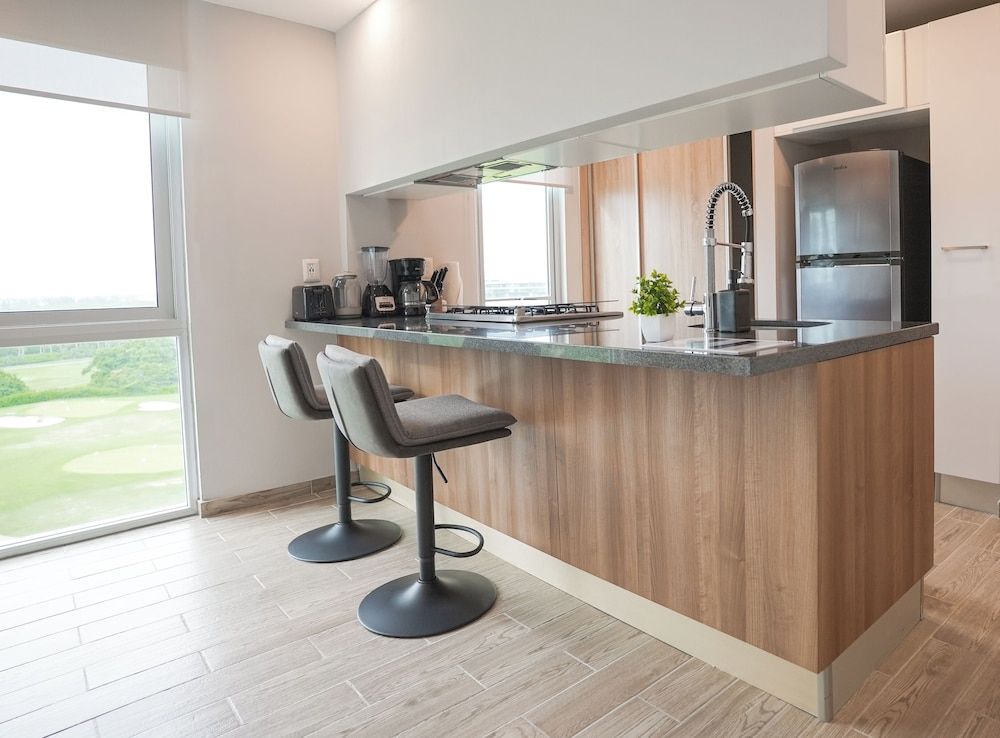 EHDEN Vacation Suites Puerto Cancún King Suite with Balcony Golf Course View 13