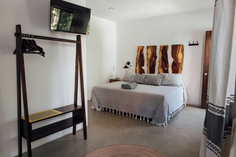 Deluxe Triple Room, Patio, Garden View