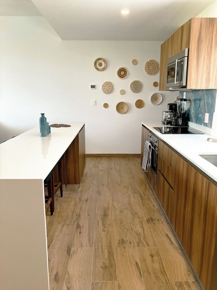 Stylish Playacar Condos w Balcony & Pool Exclusive Apartment, Garden View 11