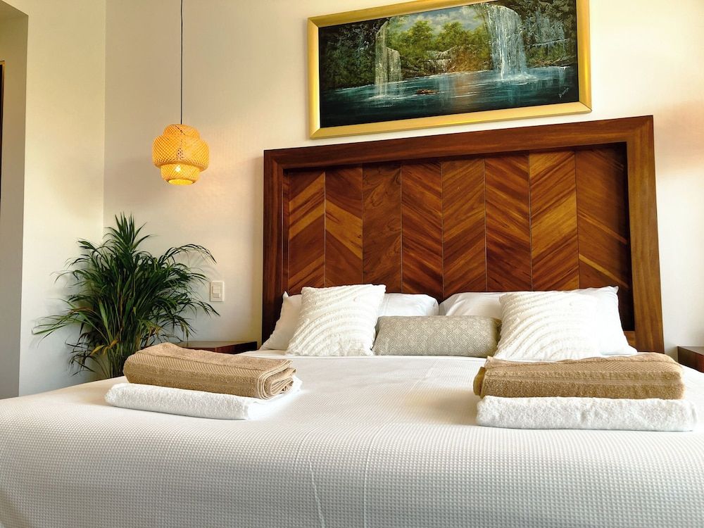 Stylish Playacar Condos w Balcony & Pool Exclusive Apartment, Garden View 9