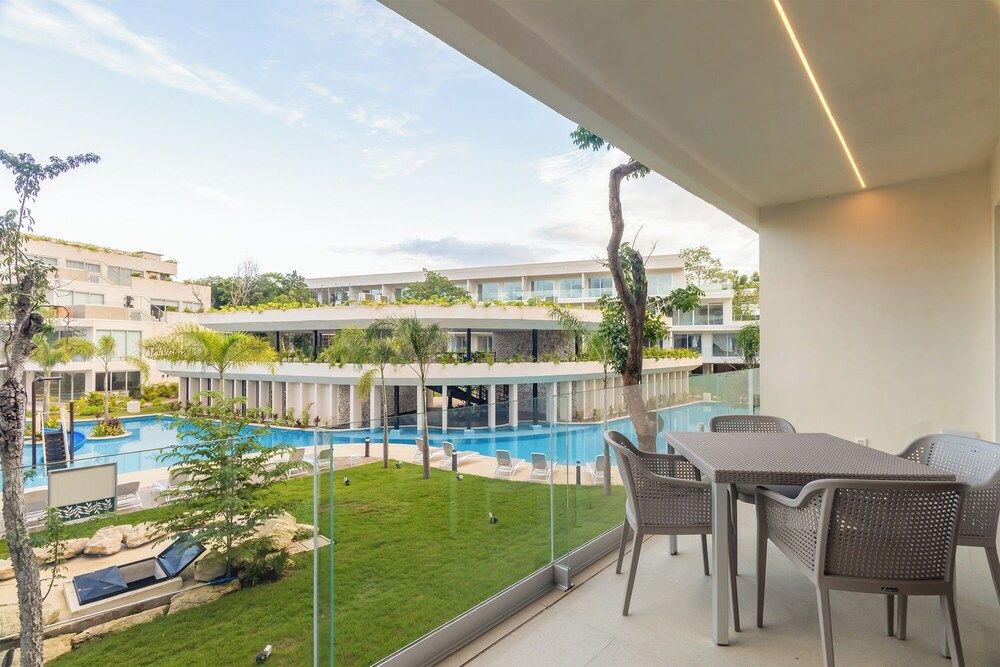 Stylish Playacar Condos w Balcony & Pool