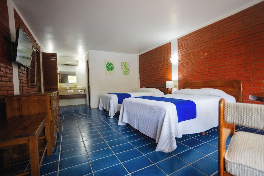 Standard Quadruple Room, 2 Double Beds, Air conditioning, Courtyard View