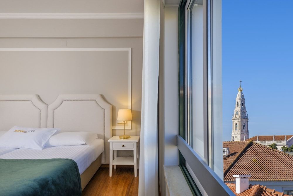 Imperhotel by Umbral Basic Triple Room, City View 9