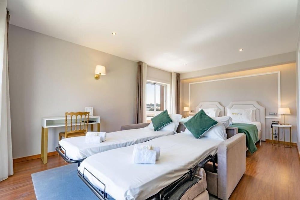 Imperhotel by Umbral Basic Quadruple Room, City View 6