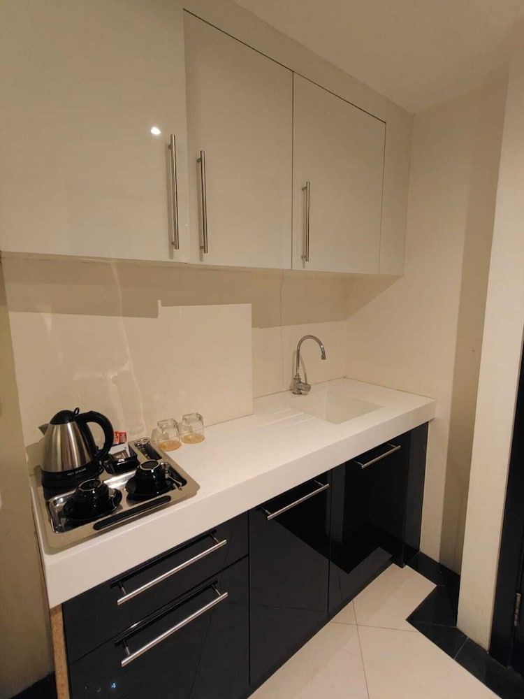 CT Suite Deluxe Studio Suite, Balcony, Garden View 4