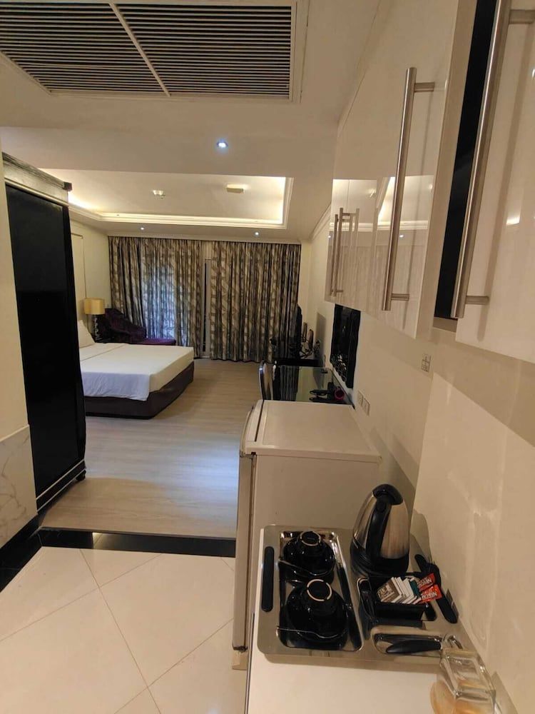 CT Suite Deluxe Studio Suite, Balcony, Garden View 3