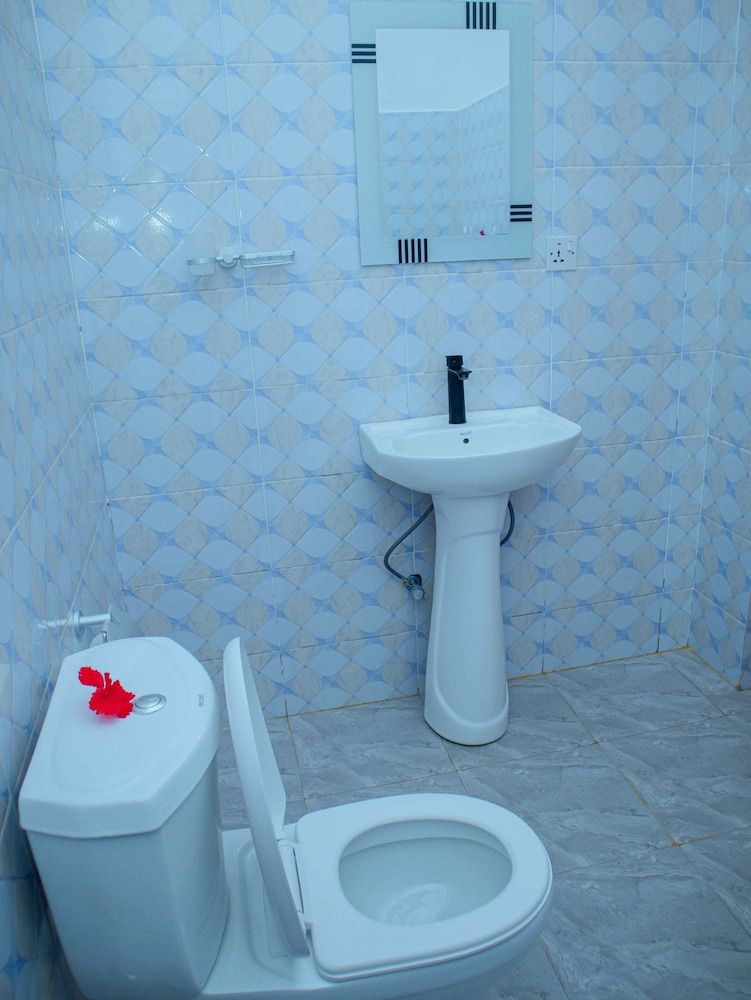 Tumaini Bungalows Standard Double Room, Balcony, Garden View 13