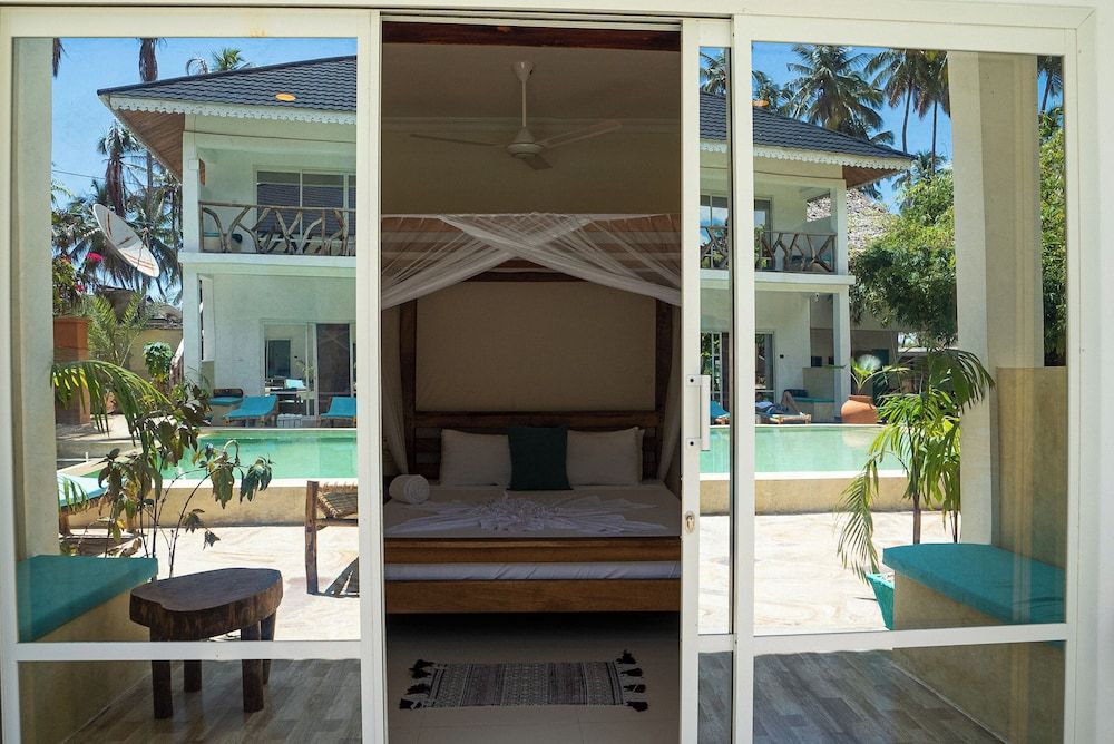 Frangipwani Economy Double Room, Patio, Pool View 5