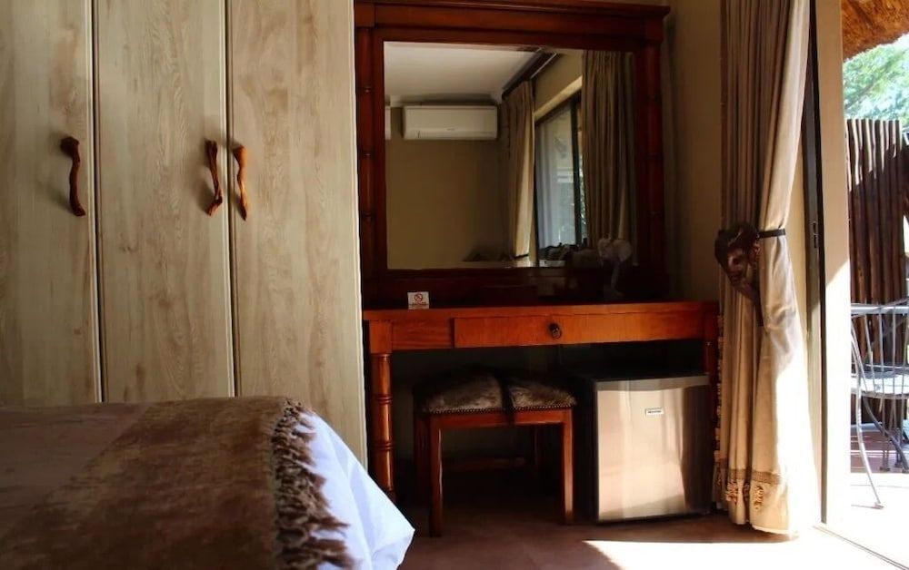 Sable Ranch Thaba Khaya Deluxe Single Room, Patio, Garden View 2