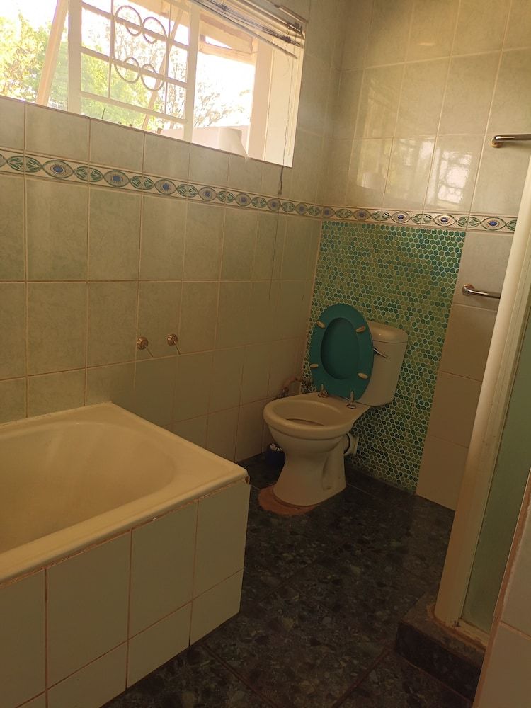 JM TOURS & SAFARIS GUESTHOUSE Comfort Double Room, Garden View 50