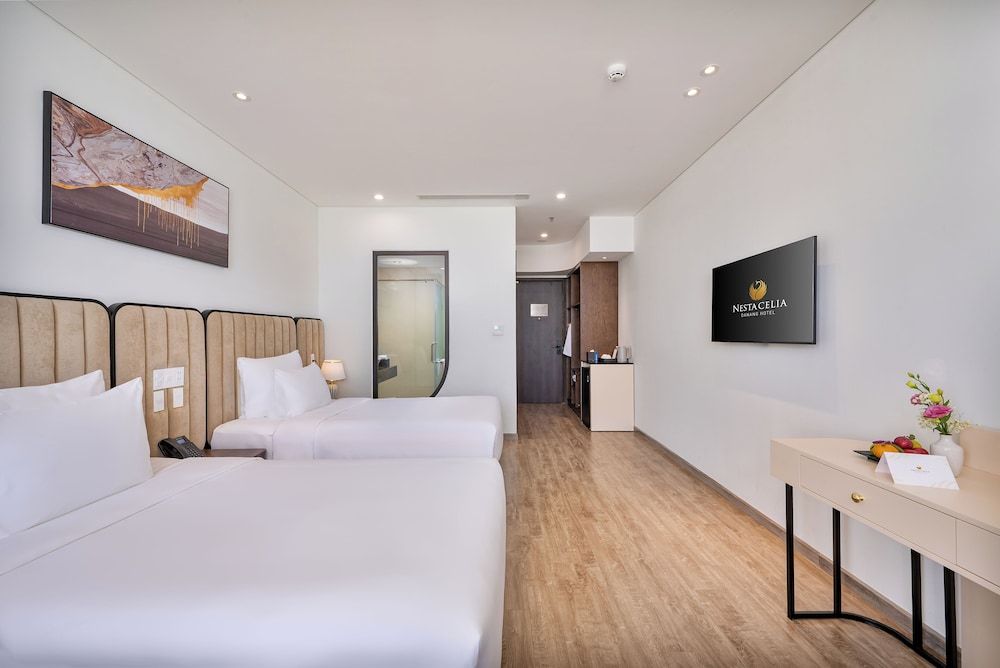Nesta Celia Danang Hotel Deluxe Twin Room, Partial Ocean View 3