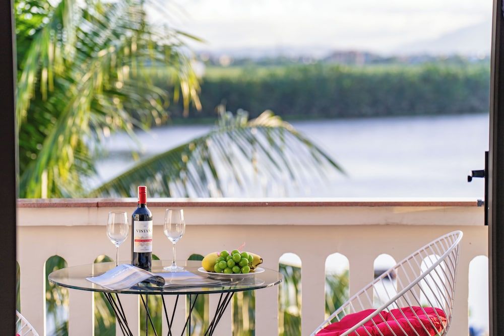 CocoPalm Hoi An River Beach By JM Villas Family Quadruple Room, Patio, River View 8