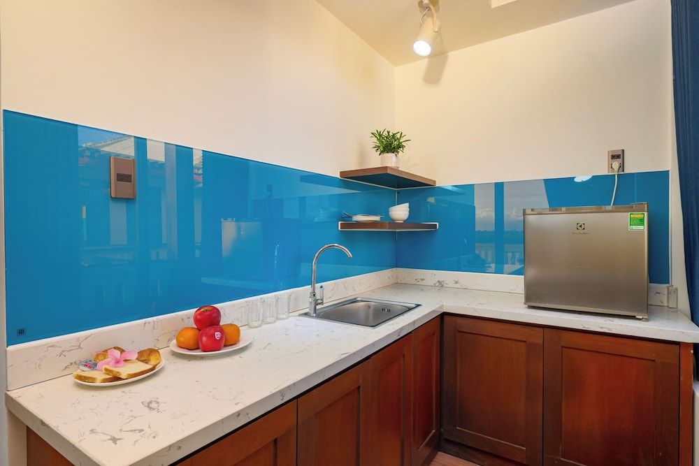 CocoPalm Hoi An River Beach By JM Villas Family Quadruple Room, Patio, River View 6