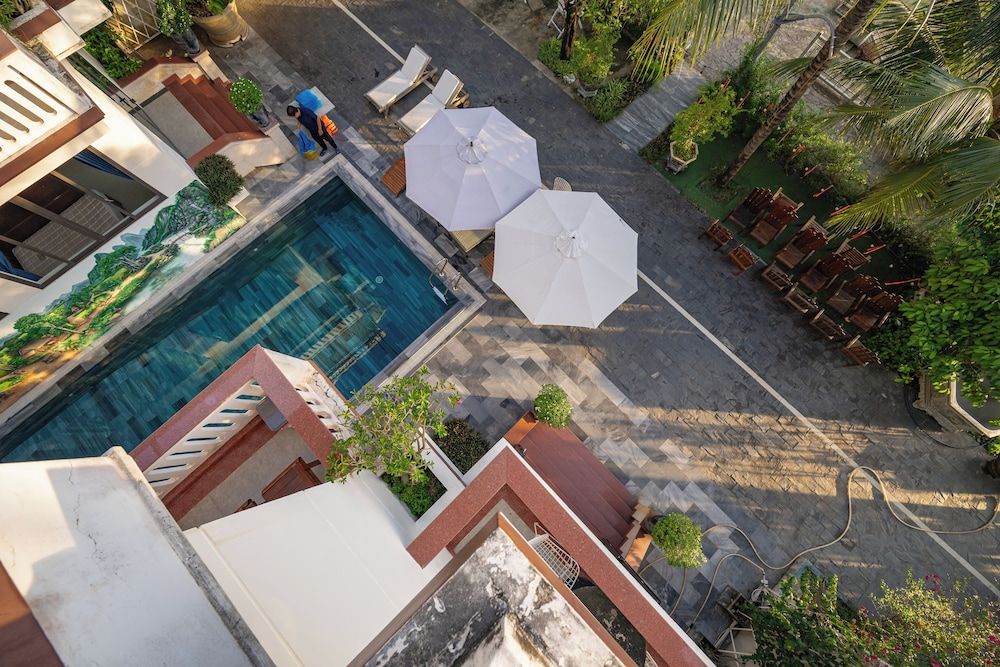 CocoPalm Hoi An River Beach By JM Villas Family Quadruple Room, Patio, River View 7