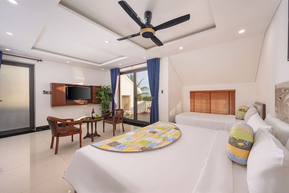 CocoPalm Hoi An River Beach By JM Villas Family Quadruple Room, Patio, River View 3