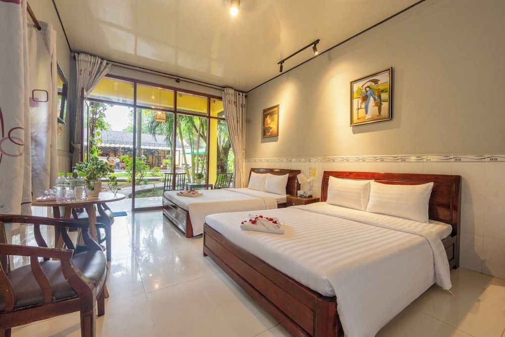 Green Bungalow Garden Resort Triple Room, Garden View 12