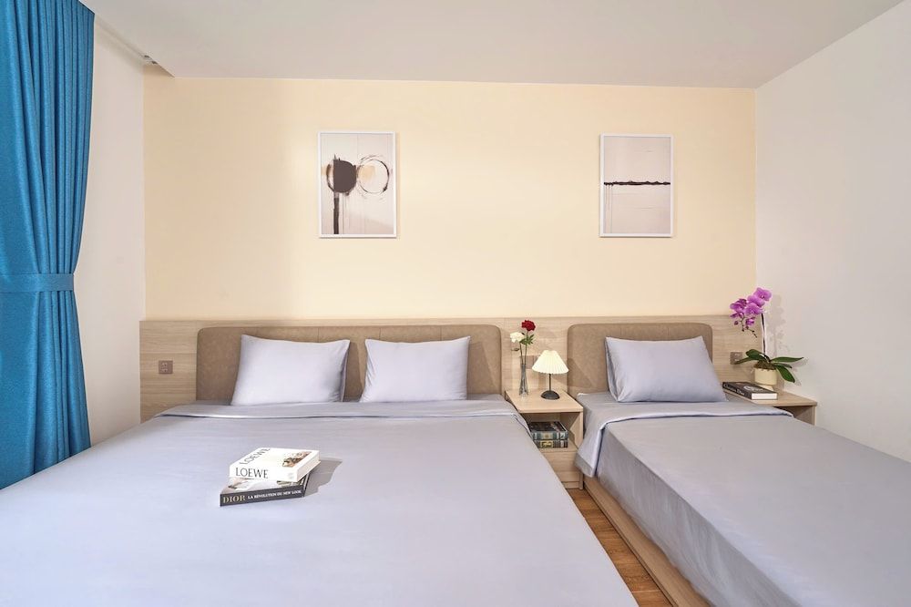 Family Triple Room, Balcony, Garden View