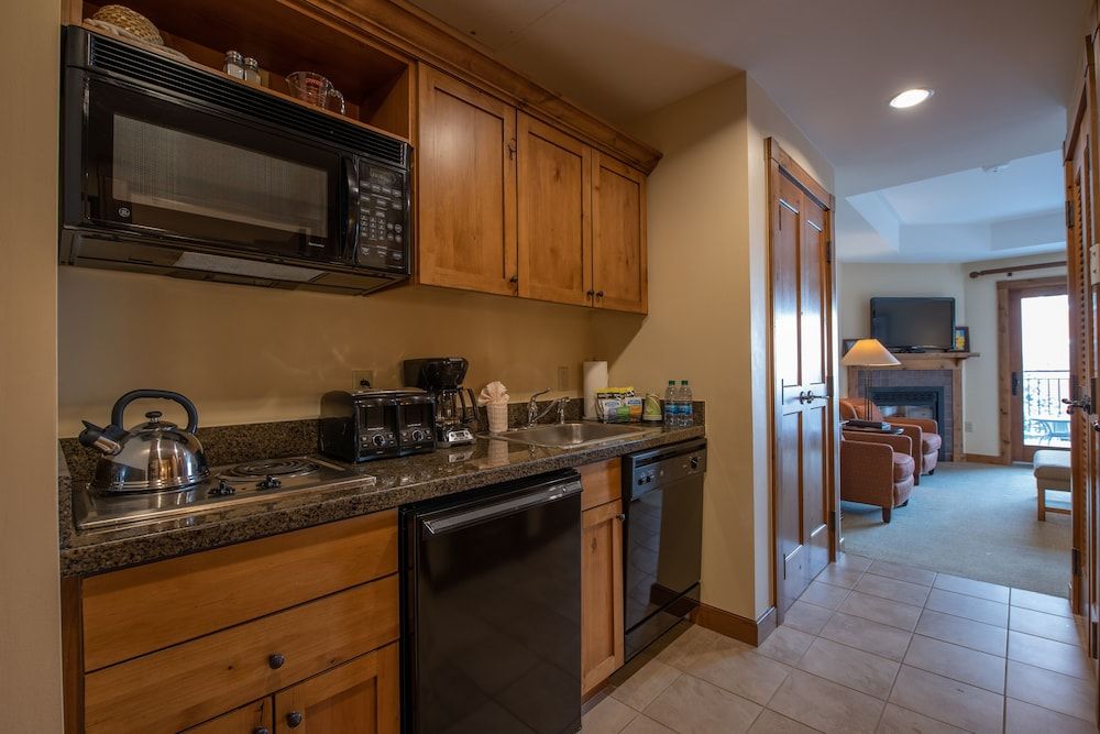 Slopeside Studio Unit With Kitchenette Studio Bedroom Condo - No Cleaning Fee! by RedAwning Studio 5