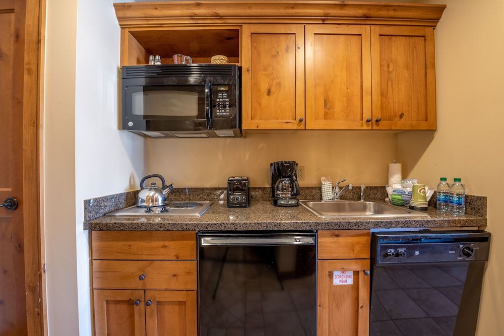 Comfortable Studio Efficiency Unit With Balcony Over Mountaineer Square Condo - No Cleaning Fee! by RedAwning Studio 11