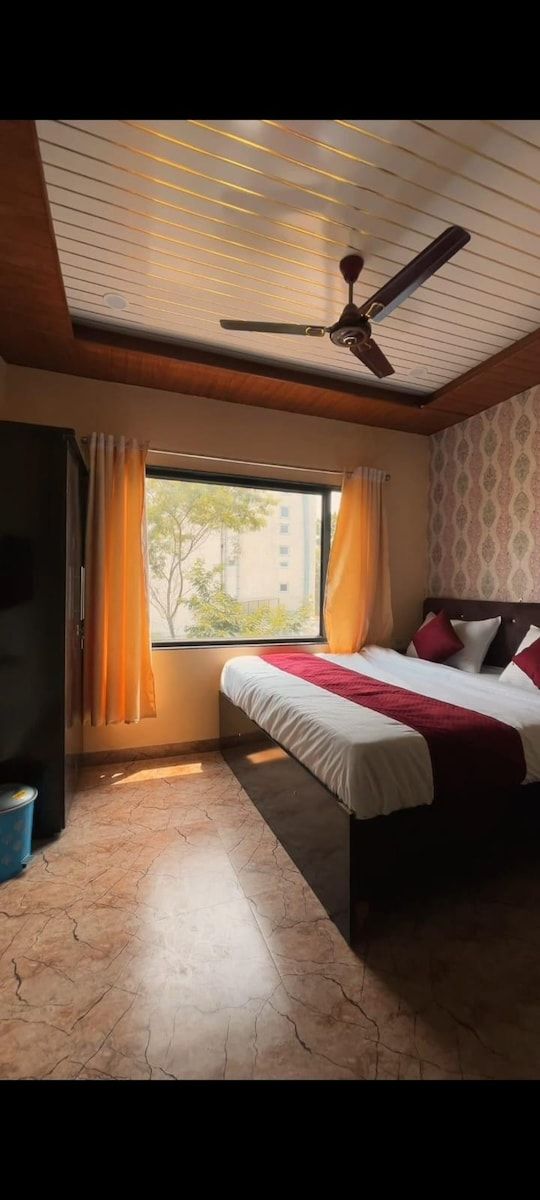 King Bed Room with City View