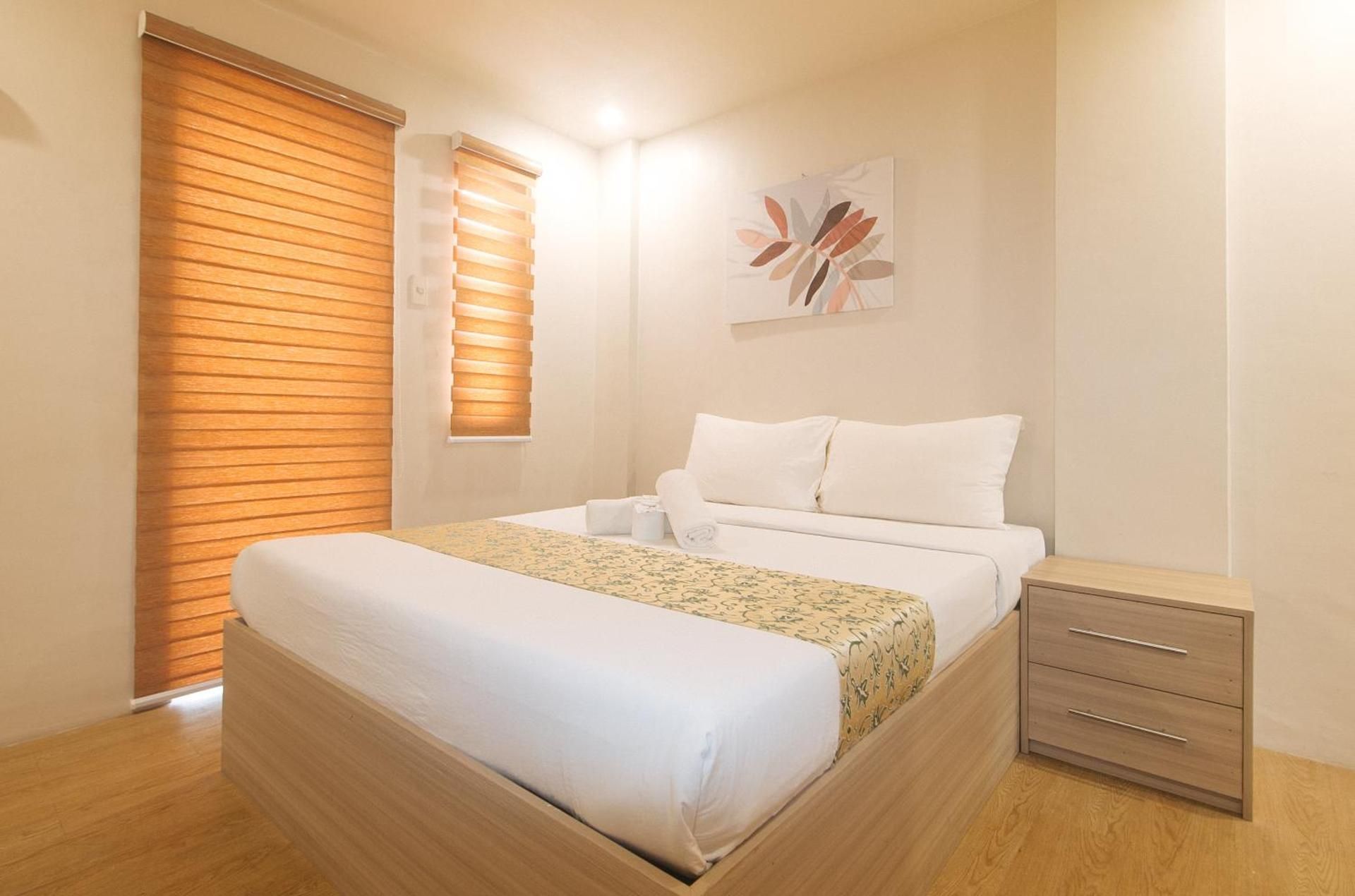 Elyseah Condotel by RedDoorz Quadruple Room