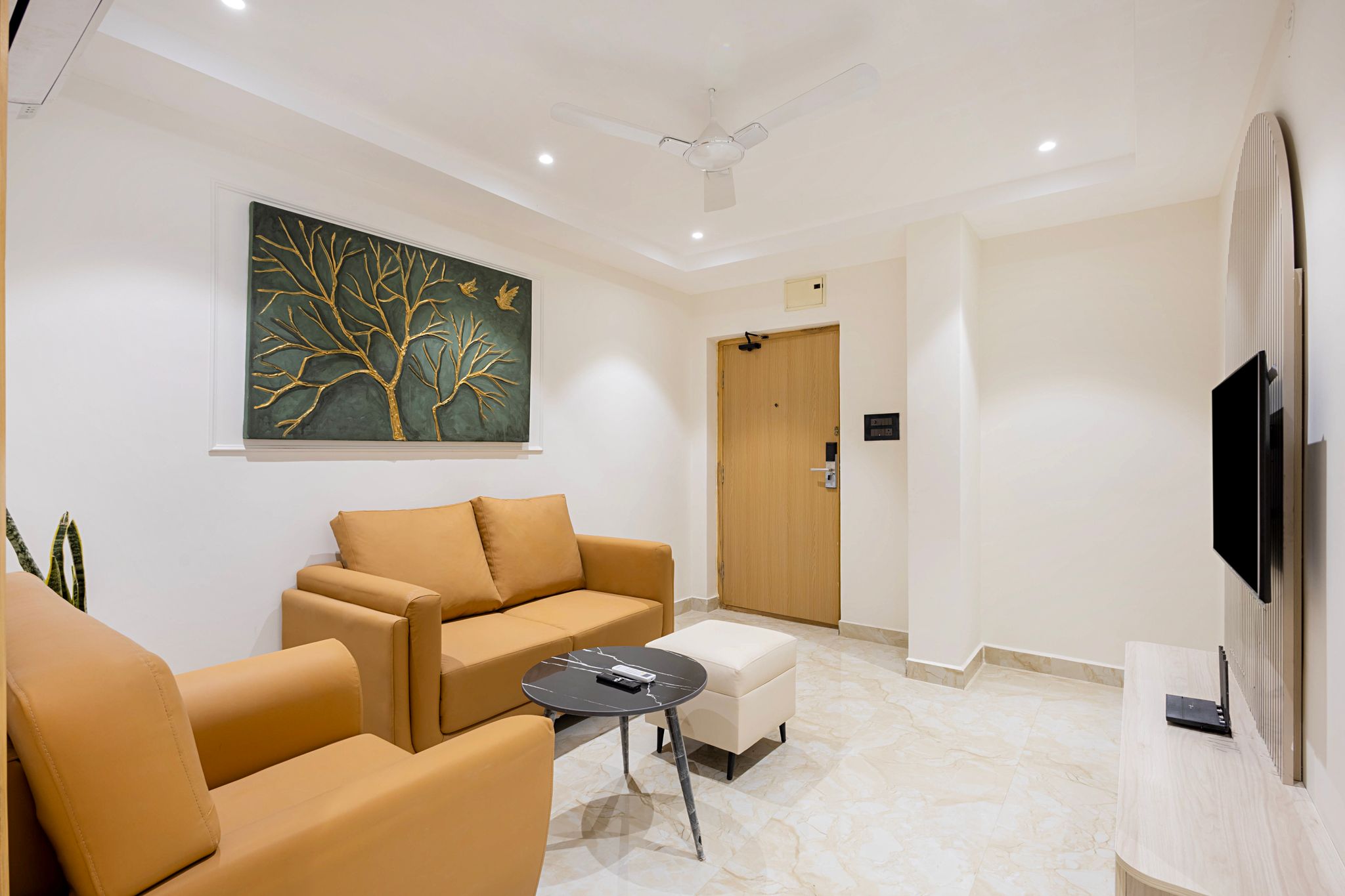 Elysium Premium Suites Madhapur Premier Balcony Suite with kitchenette and Living room 5
