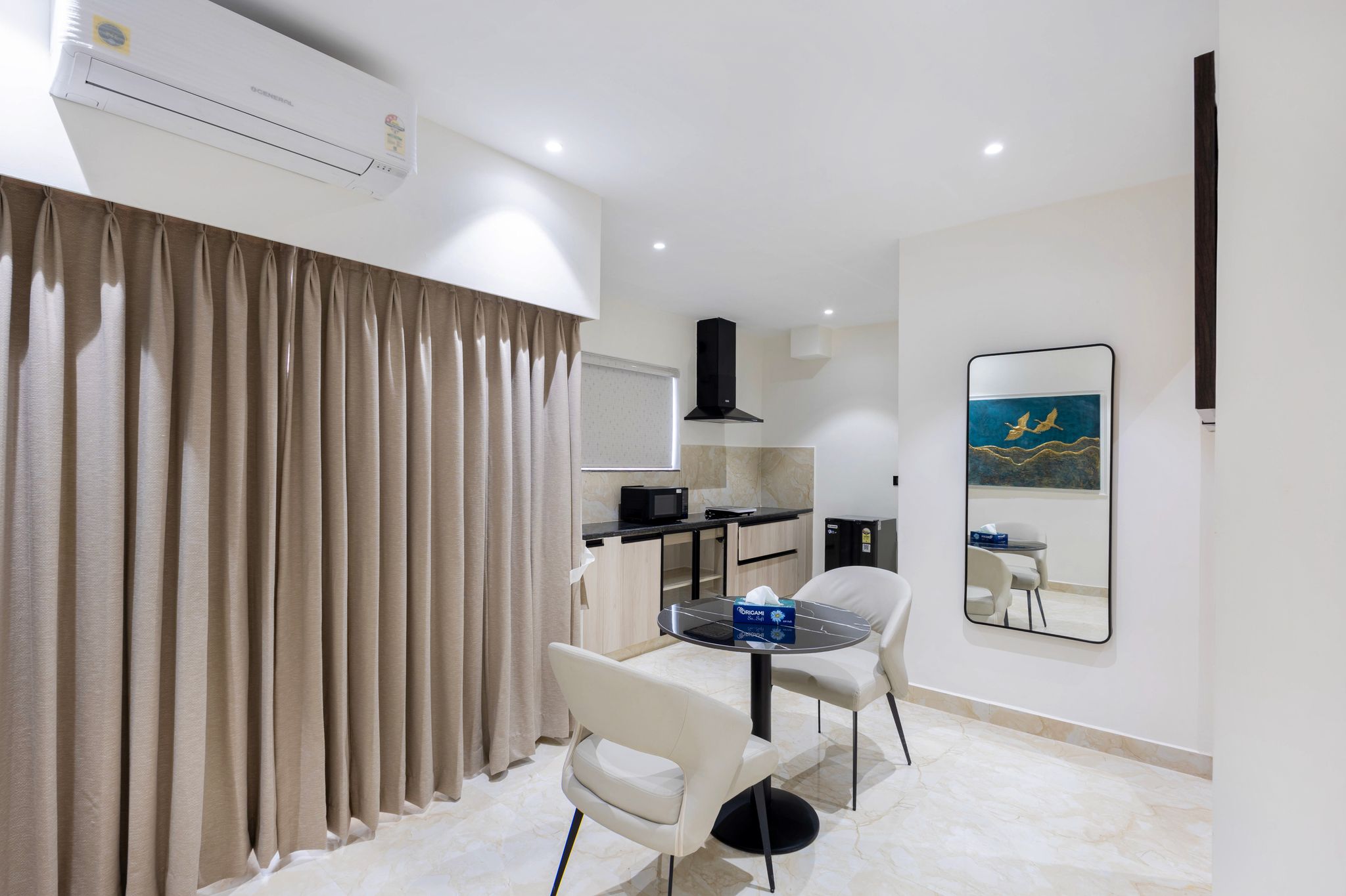 Elysium Premium Suites Madhapur Premier Balcony Suite with kitchenette and Living room 6