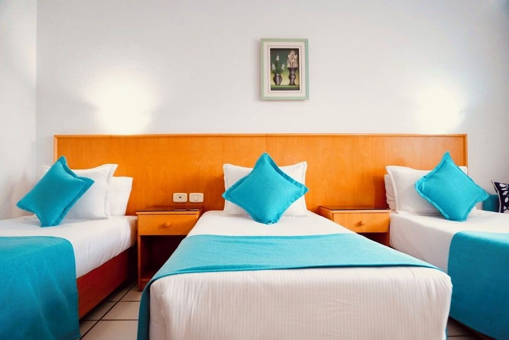 Le National Family Triple Room 4