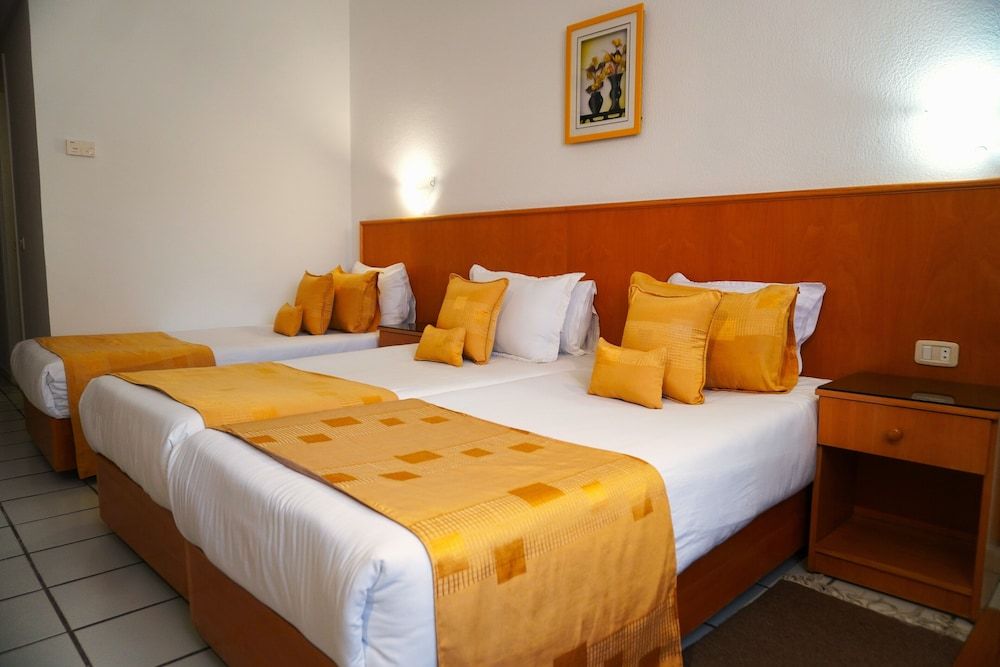 Le National Family Triple Room