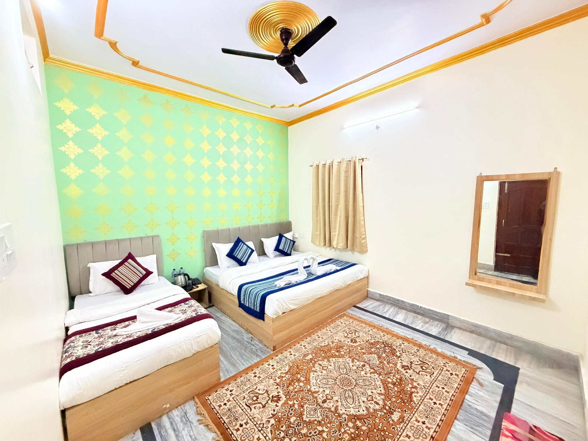 The Unnati Residency Triple Bedroom 2