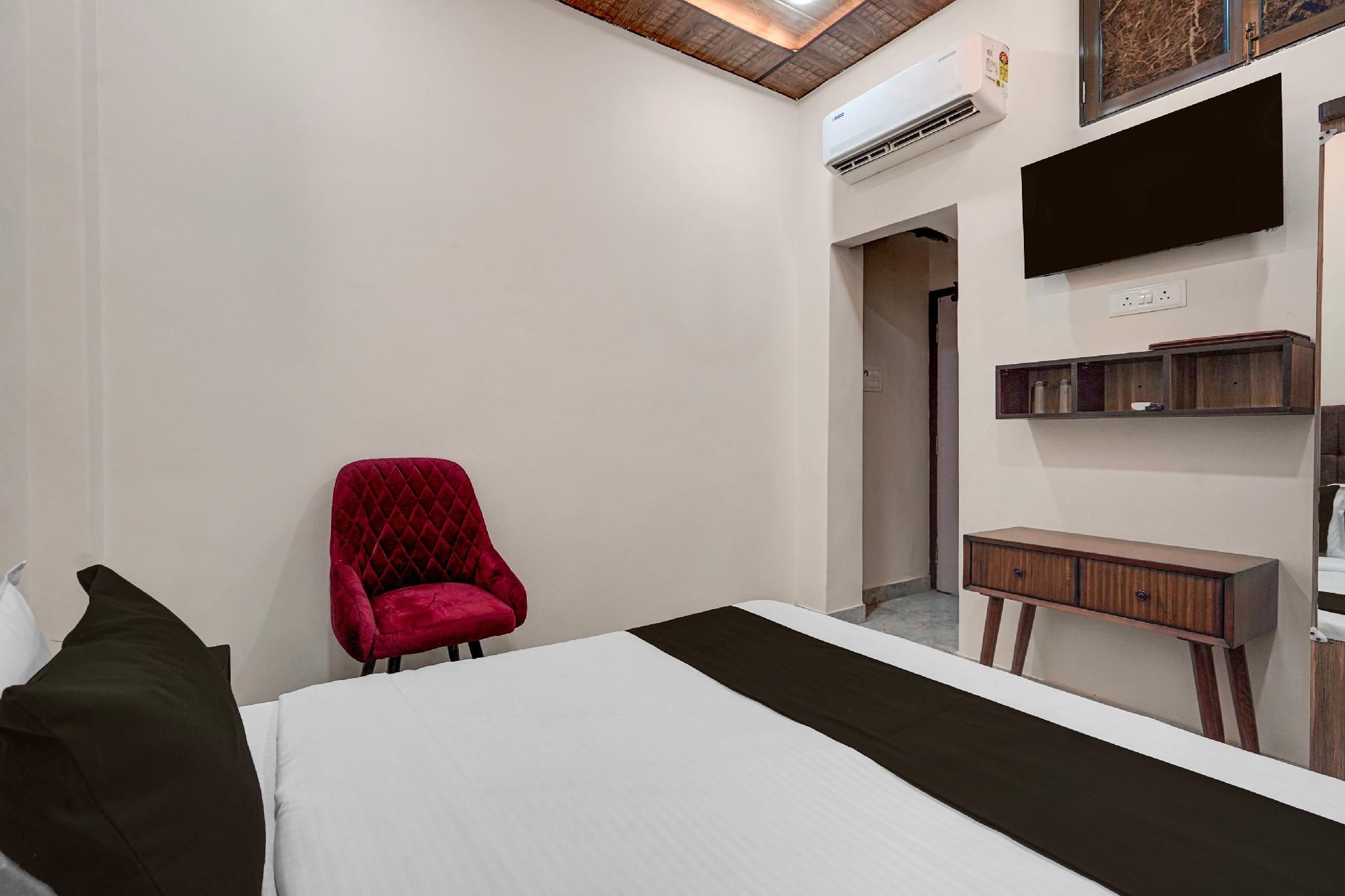 Hotel O Divyam Grand Classic Triple Room 3