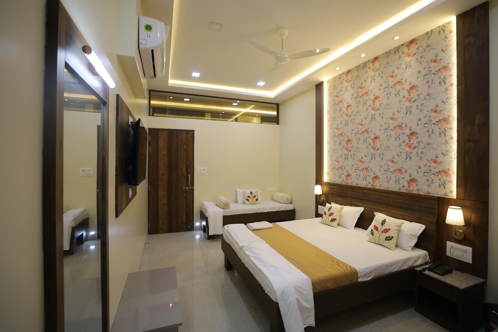 Triple Bed Room With Air Conditioning