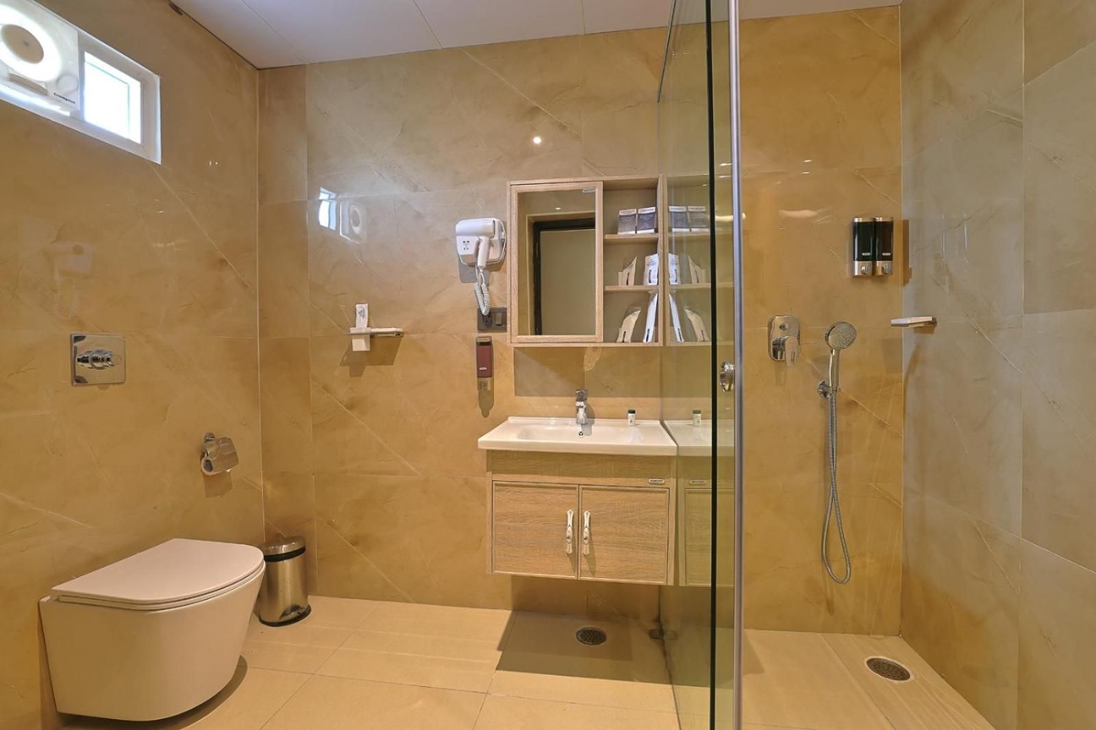 Grand Continent Premier Banjara Hills Deluxe Room Twin Bed 3