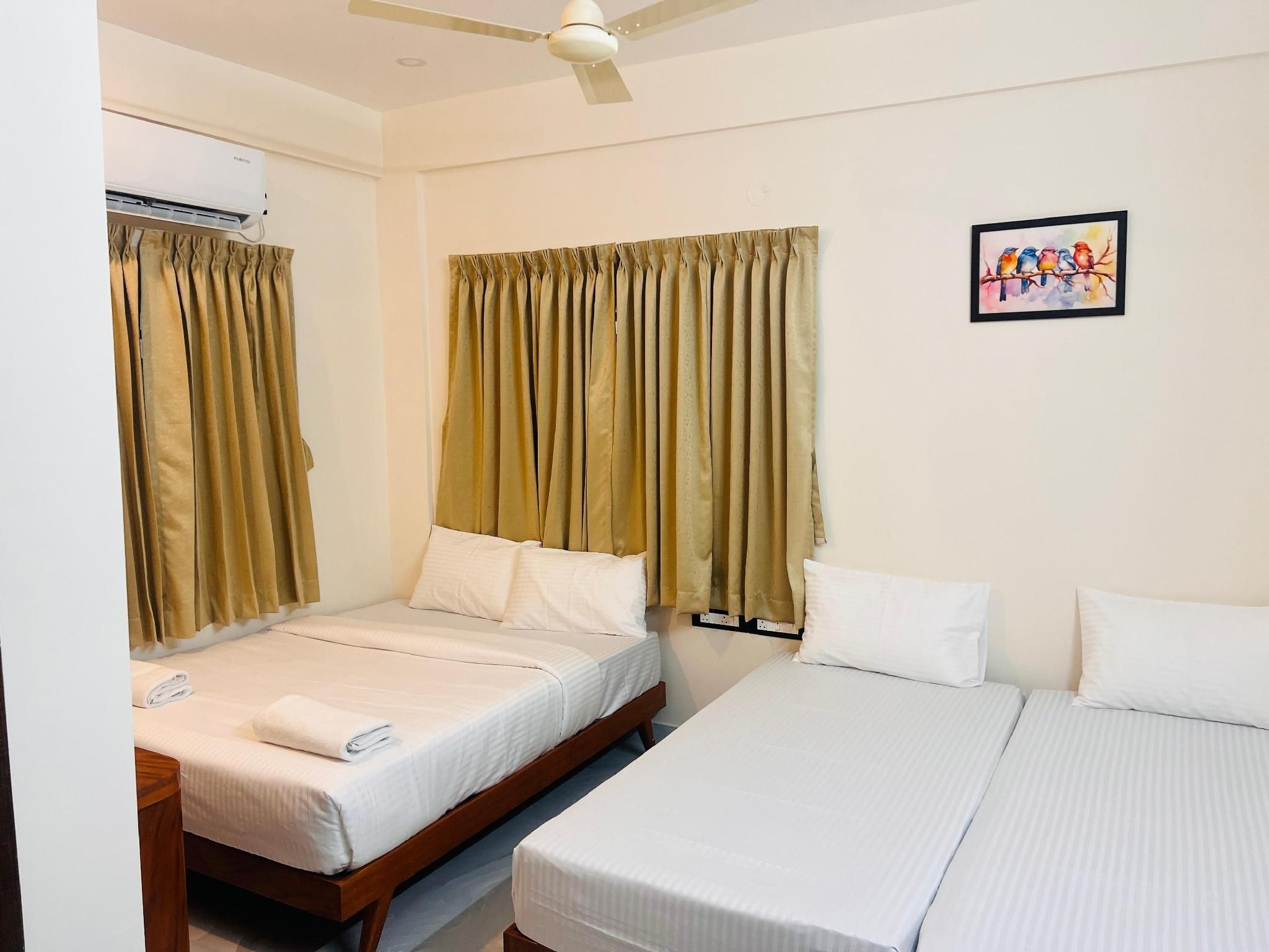 Vallimony Luxury Stays- Padmanabhaswamy temple Family Deluxe 3