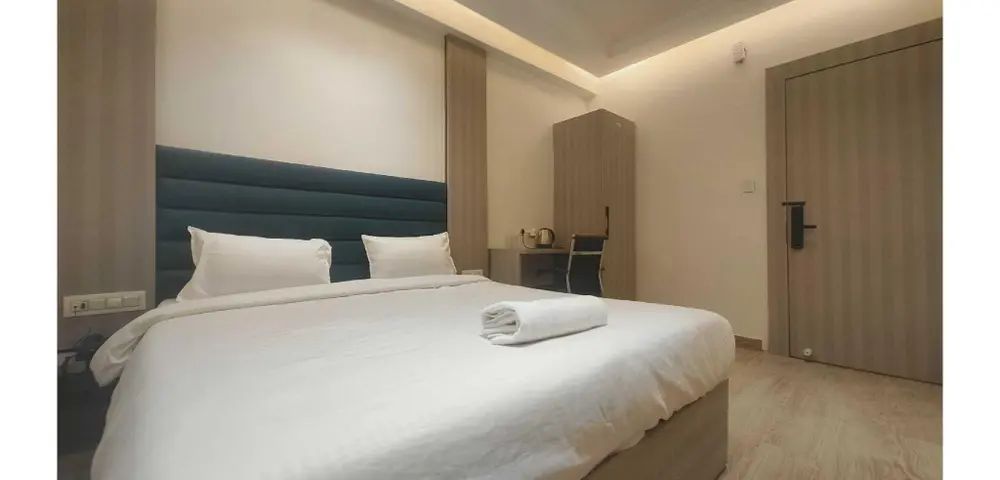 Collection O Yamuna Bridge Prayagraj Classic Triple Room 4