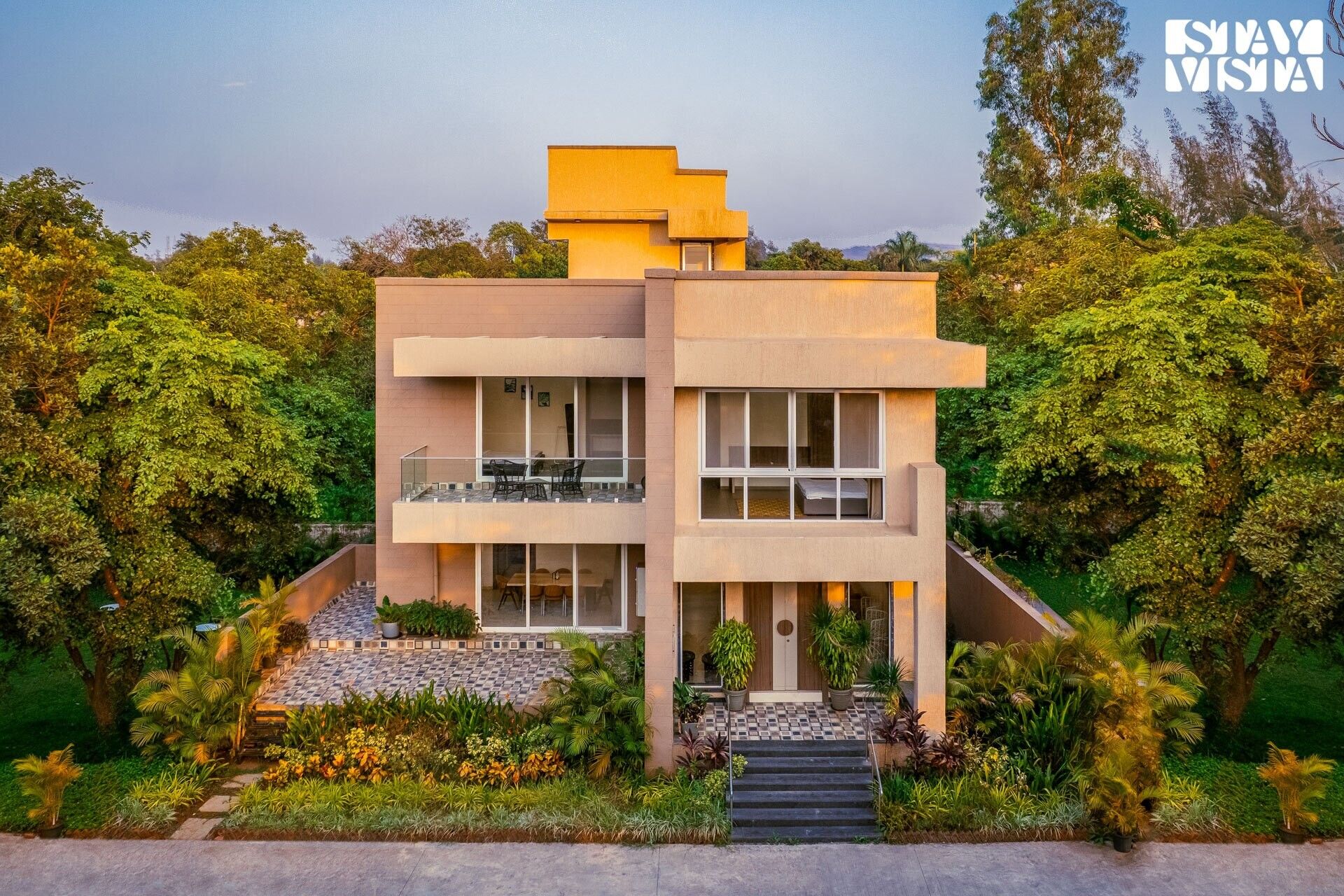 StayVista's Rosso with Outdoor Pool, Theatre-Disc Room & Games Room