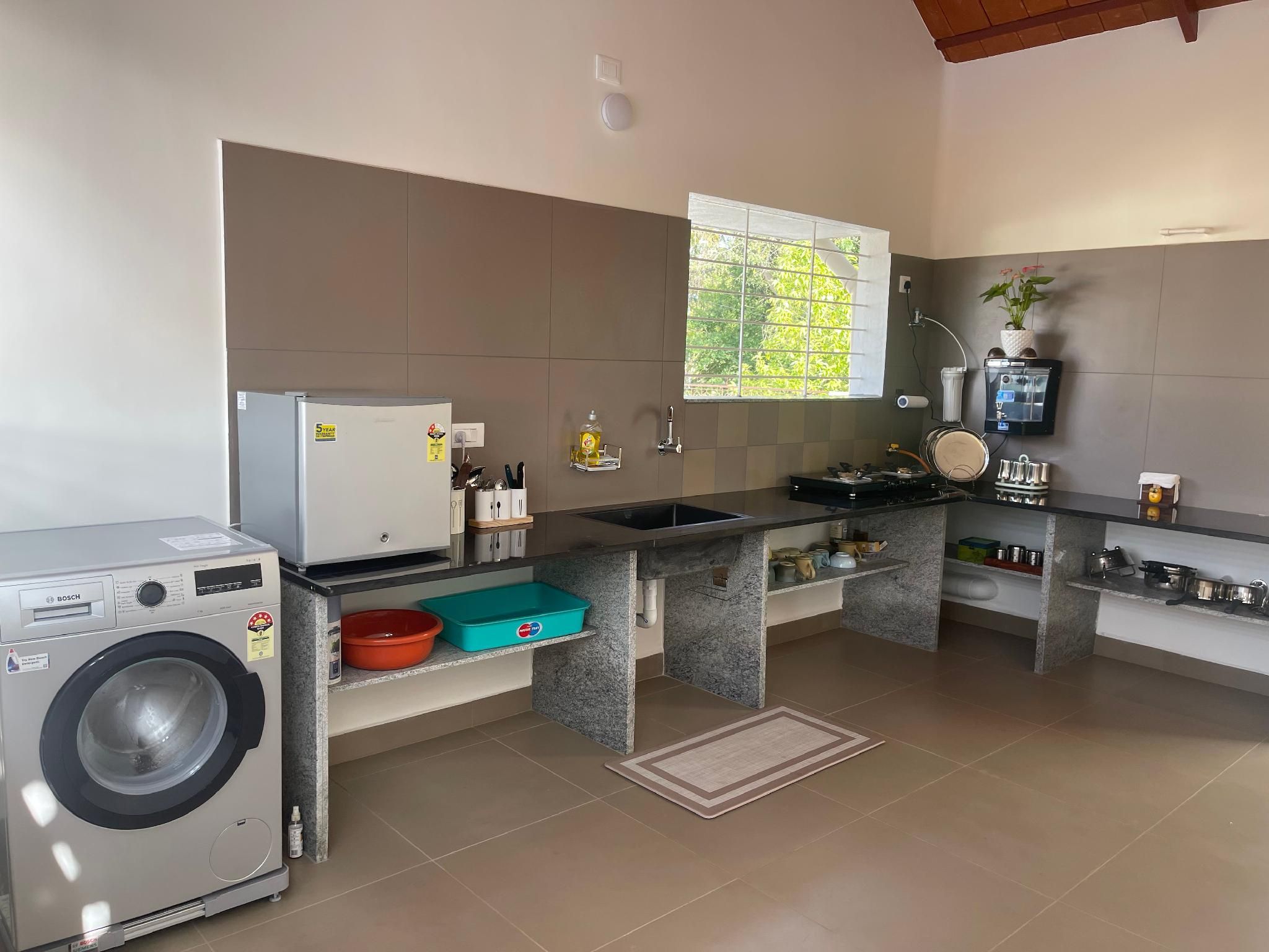 Gokulam Guest House Balcony Classic Garden View