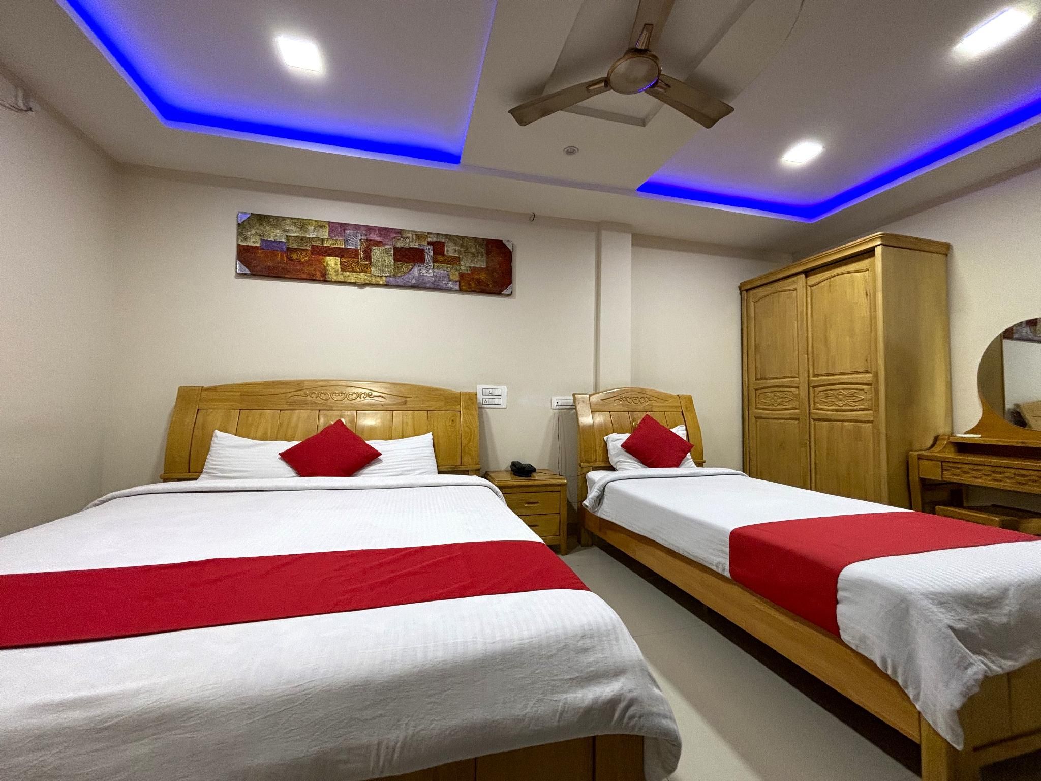 DV Residency Bhadravathi Deluxe Triple Room