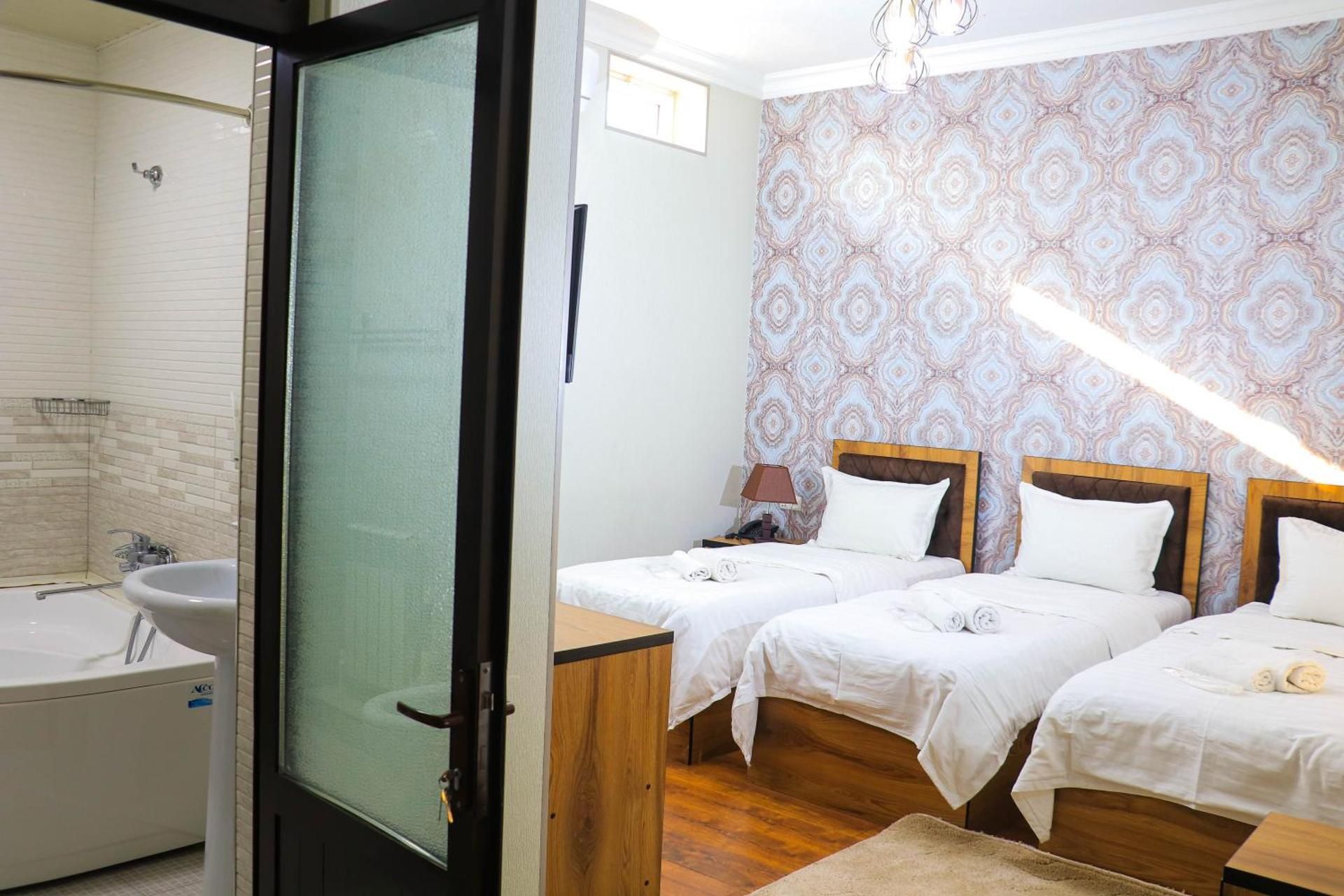 ELANI Hotel Deluxe Triple Room 2