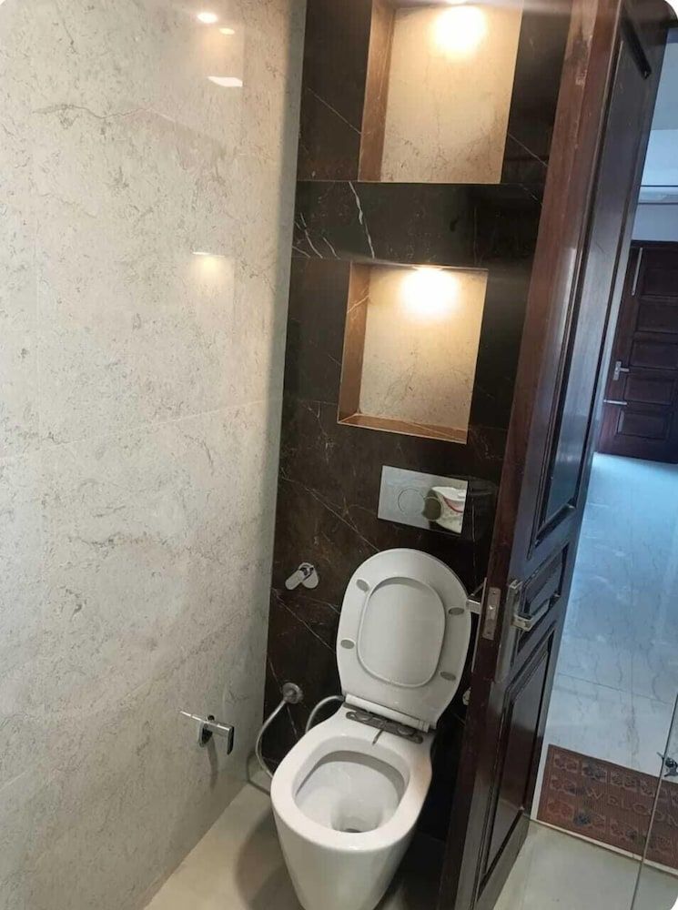 Raised toilet seat